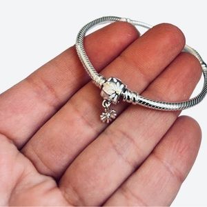 New in original box Pandora bracelet, silver with mini sunflower closure